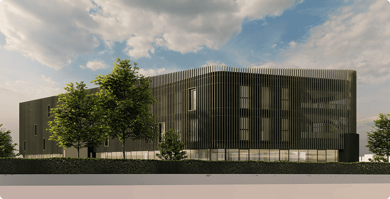 Vue latérale du programme de bureaux Pégase à Laxou avec façade à lames verticales, BMG Foncière, filiale du Groupe FSDV.